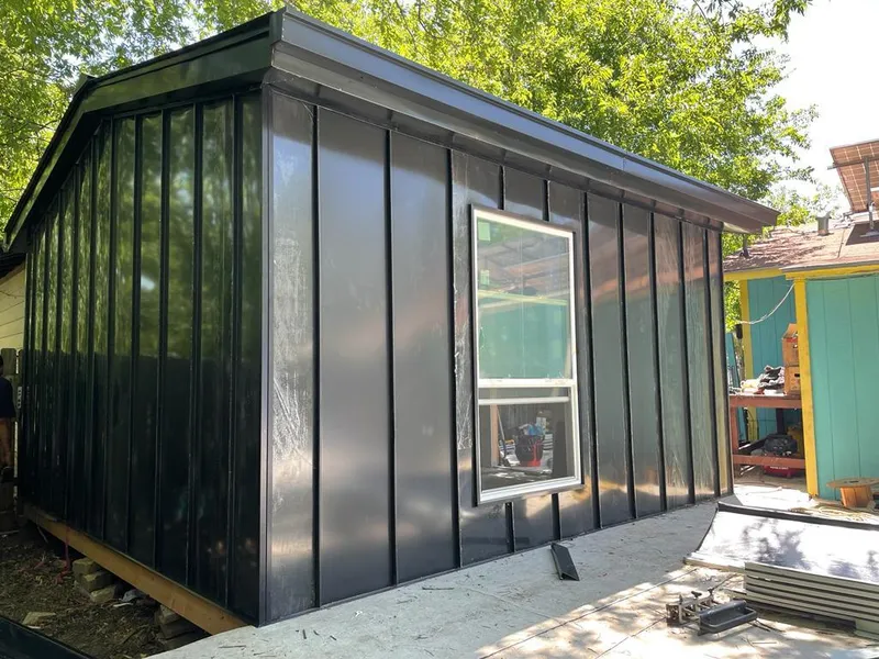 Black standing seam metal wall panels for Metal Roof Installation in Lewiston