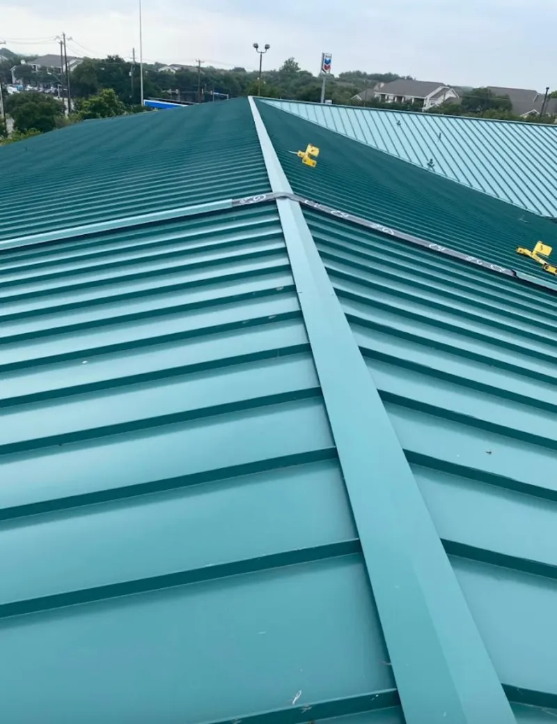 Green commercial metal roof ridge and valley for Metal Roof Repair in Lewiston