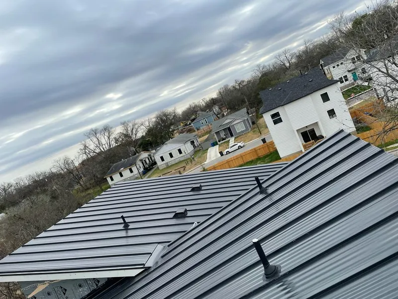 Standing seam metal roof panels with vents for Skylight Repair in Lewiston